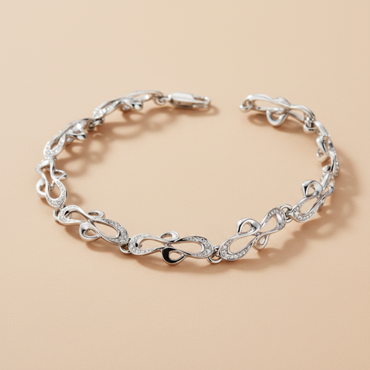 Fleur de Lis karkötő - 14k, fehér arany, gyémántok
