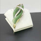 Amazon brooch